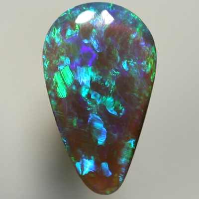SOLID BLACK CRYSTAL OPAL Sparkles of green and blue 
